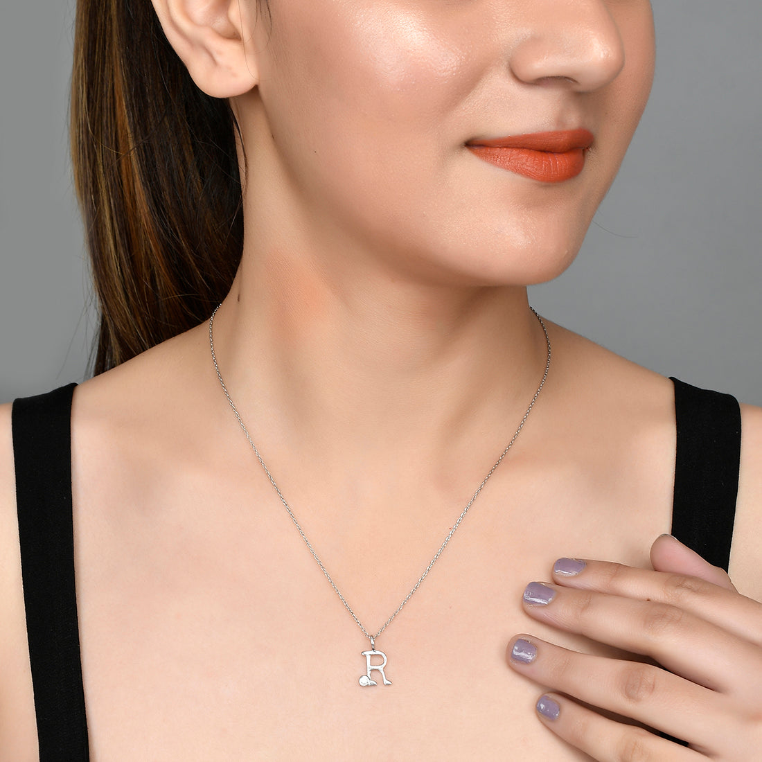 Sterling Silver Alphabet R Round Cut CZ Pendant