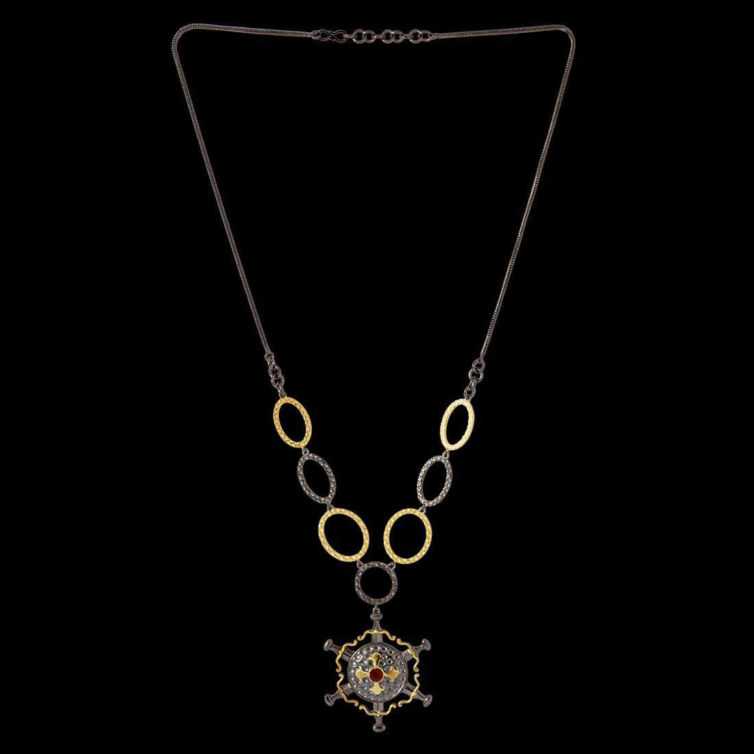 statement necklace in shining black and gold tone finish