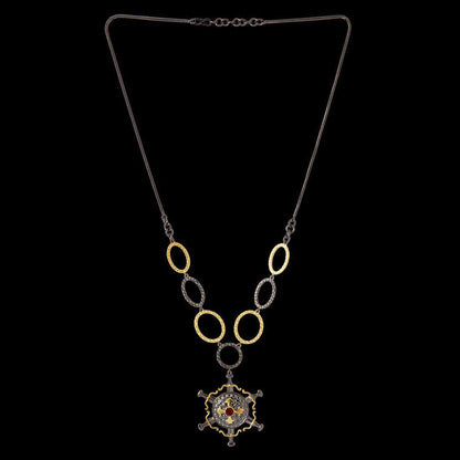 statement necklace in shining black and gold tone finish