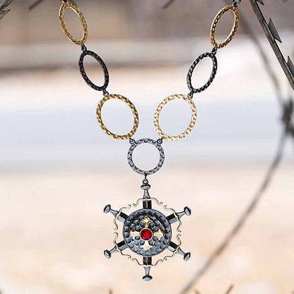 statement necklace in shining black and gold tone finish