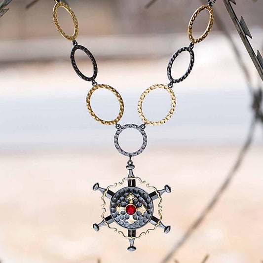 statement necklace in shining black and gold tone finish
